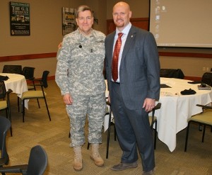 Maj. Gen. Steven Smith, USA (l), director for the U.S. Army Chief Information Office/G-6 Cyber Directorate, joins John Snider, chapter president, at the November luncheon.